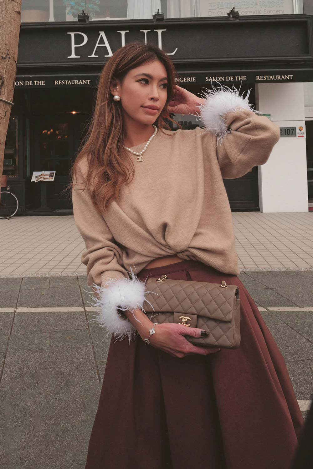 寬鬆羽毛接袖針織衫